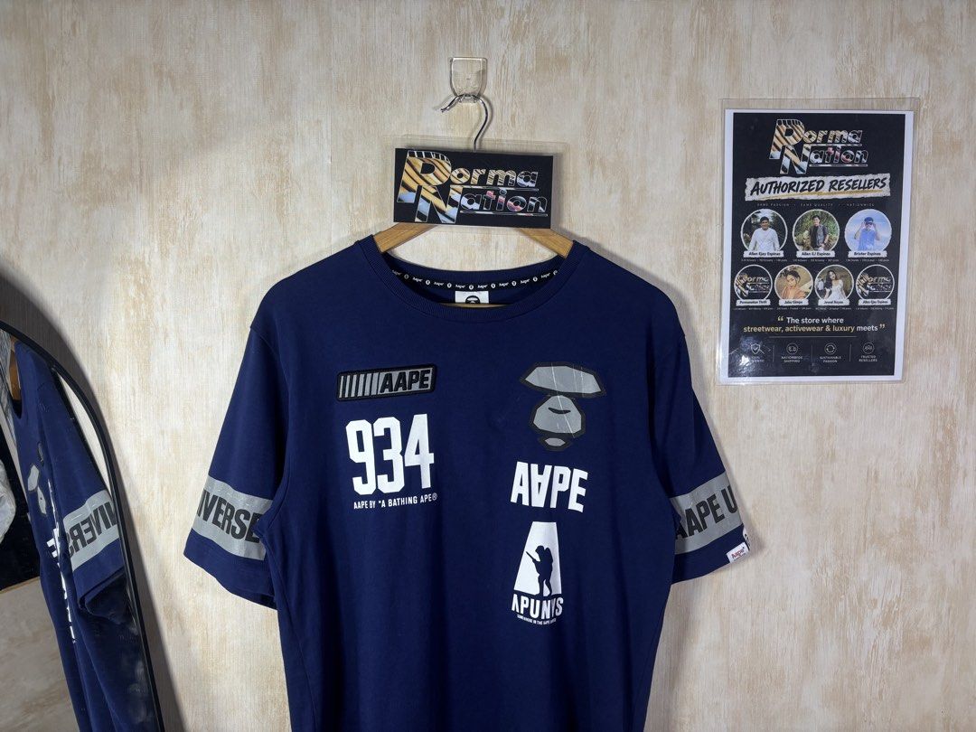 AAPE GRAPHIC SHIRT (Category: Tshirts & Polo Shirts ) located in Cabuyao City. Submitted by pormanation-thrift-store (Listing ID 1468622529, Image 2). Description: AAPE GRAPHIC SHIRT Condition: GOOD Color rate: 9/10 Size: MEDIUM Dimes: 20”Wx27”L Issue: MINIMAL CRACK SA PRINT ✅ Price: 800 .