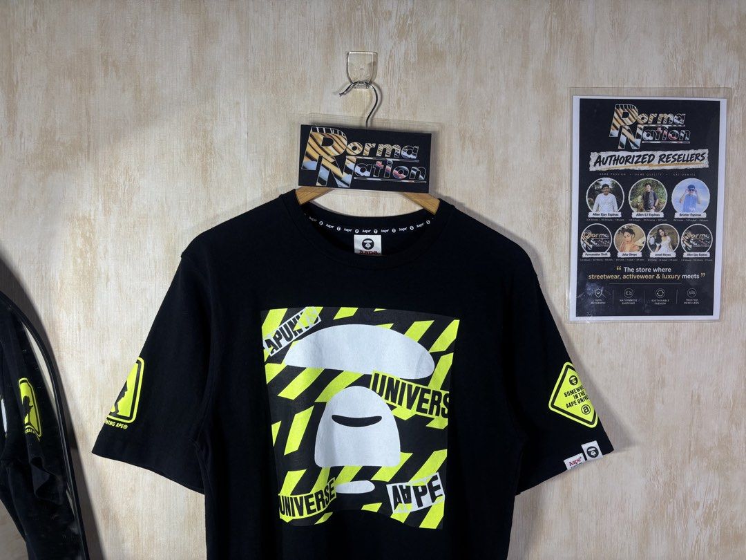 AAPE HAZARD SHIRT (Category: Tshirts & Polo Shirts ) located in Cabuyao City. Submitted by pormanation-thrift-store (Listing ID 1468621523, Image 2). Description: AAPE HAZARD SHIRT Condition: LIKE NEW Color rate: 10/10 (PWEDE SA MASELAN) Size: MEDIUM Dimes: 19”Wx 26.5”L Issue: NONE✅ Price: 1200.