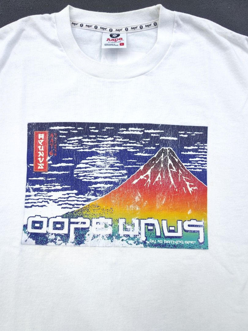 Aape Motif Mount Fuji Tee (Category: Tshirts & Polo Shirts ) located in Bulacan. Submitted by emilj23 (Listing ID 1468522030, Image 2). Description: Aape Motif Mount Fuji Tee Size S on Tag L 26 W 21.5 Condition 9/10 Color rate 9/10 Issue Crackprints,Minimal Stain.