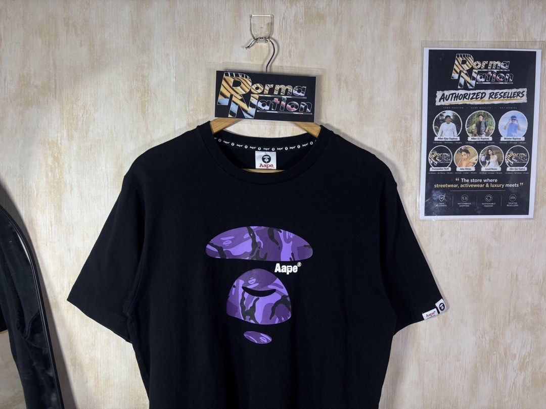 AAPE PURPLE CAMOU HEAD TEE (Category: Tshirts & Polo Shirts ) located in Cabuyao City. Submitted by pormanation-thrift-store (Listing ID 1468620856, Image 2). Description: AAPE PURPLE CAMOU HEAD TEE Condition: LIKE NEW Color rate: 10/10 (PWEDE SA MASELAN) Size: MEDIUM Dimes: 20”Wx28”L Issue: NONE✅ Price: 1300.