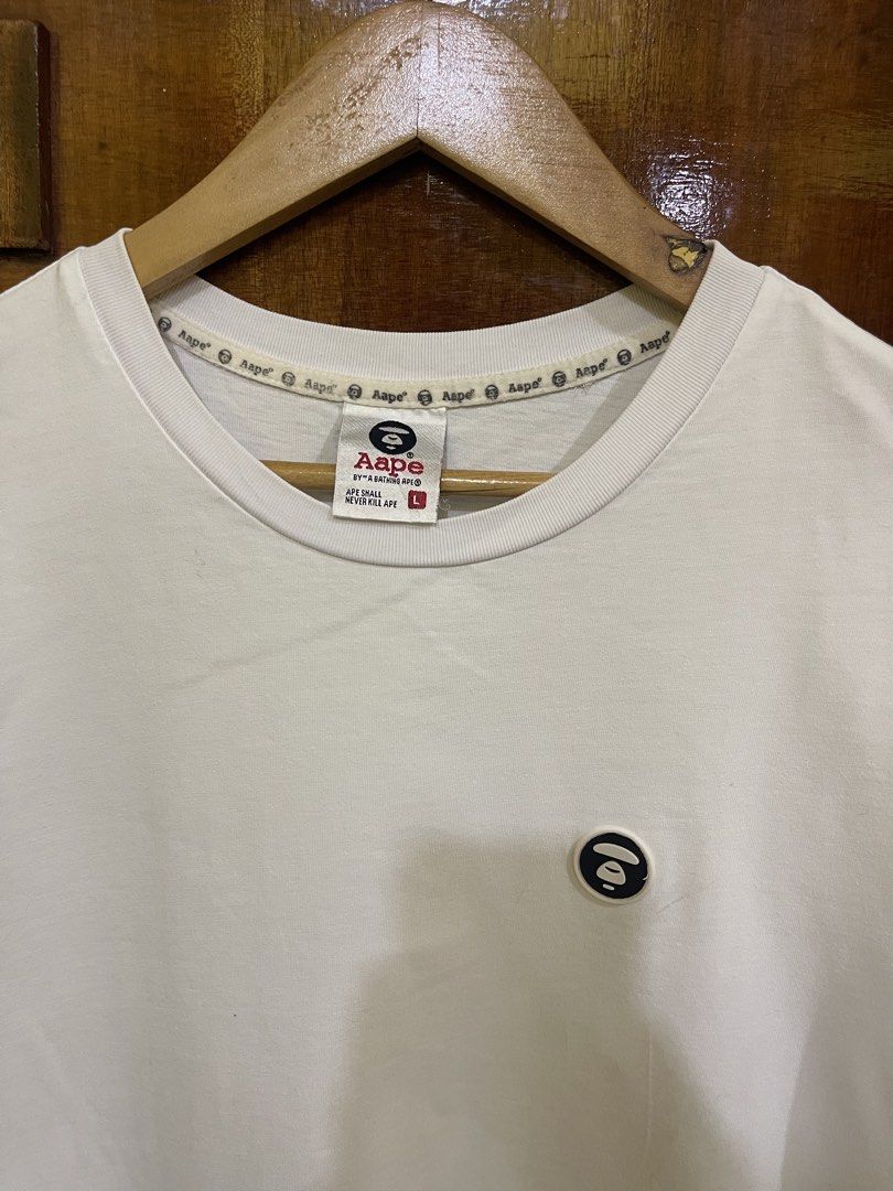 Aape Shirt (Category: Tshirts & Polo Shirts ) located in Marikina City. Submitted by greatfindsmnlph (Listing ID 1468506030, Image 3). Description: Aa pe Shirt Price: 280 Size: Medium Width: 19.5 Length: 28 Color: White Color Rate: 10/10 Condition: 9.9/10 cut washtag Very nice in actual.