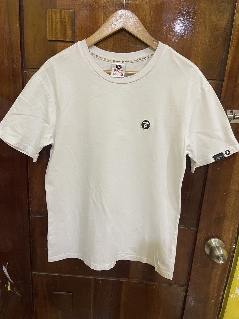 Aape Shirt (Category: Tshirts & Polo Shirts ) located in Marikina City. Submitted by greatfindsmnlph (Listing ID 1468506030, Image 1). Description: Aa pe Shirt Price: 280 Size: Medium Width: 19.5 Length: 28 Color: White Color Rate: 10/10 Condition: 9.9/10 cut washtag Very nice in actual.