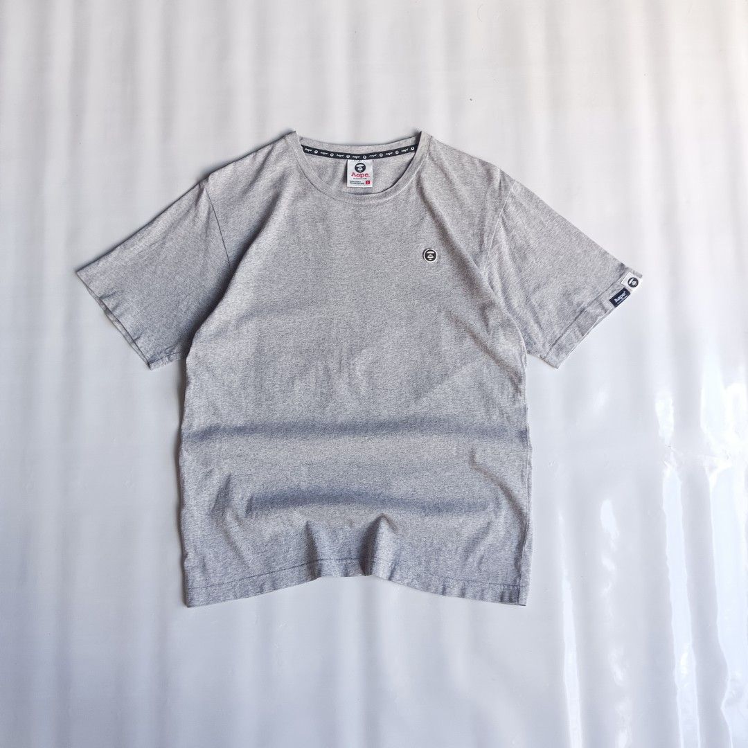 Aape Shirt (Category: Tshirts & Polo Shirts ) located in San Luis. Submitted by 3fted.au (Listing ID 1468634880, Image 1). Description: Aape Excellent Condition 9.5/10 Color Rate Cut washtag, minimal unnoticable hairline sa side print best fit M Length: 26 Width: 19.5 🏷️300.