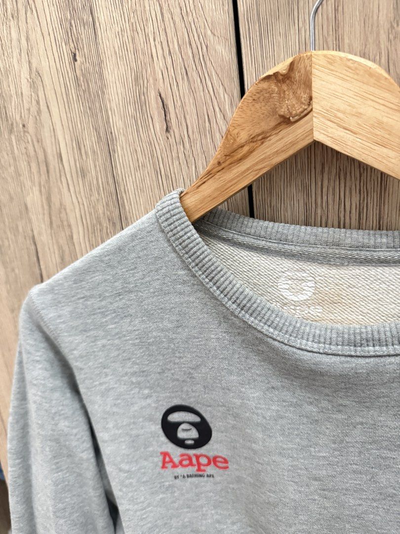Aape Sweater (Category: Coats, Jackets and Outerwear) located in Quezon City. Submitted by dianneechloee (Listing ID 1468596759, Image 3). Description: ୨୧ ‧₊˚ 🩶 AAPE GREY SWEATER 🧸 ౨ৎ AAPE grey sweater 🩶 ౨ৎ size XS, can fit up to semi-medium (S-M) 🎀 ౨ৎ comfy & easy to style 🛋️ ౨ৎ perfect for casual / streetwear fits 🛹 ౨ৎ Thick Fabric!! ♡ price: ₱220 ♡ shipping via J&T Express / Lalamove 📦💌 ♡ GCash payment 💸 ♡ negotiable for sure buyers! 