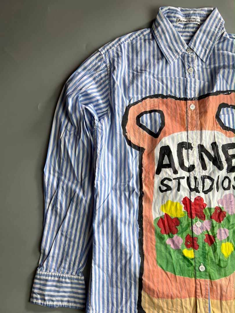 Acne Studios - S/S19 Ceramic-Print Striped Button Down - Shirt (Category: Luxury Apparel) located in San Pablo. Submitted by hiddenrygn (Listing ID 1468632598, Image 2). Description: Acne Studios - S/S19 Ceramic-Print Striped Button Down - Shirt Size : 34 on tag(18” 26”) No flaws Minor signs of usage DM!.