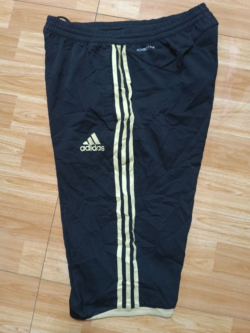Addidas Shorts (Category: Shorts) located in San Carlos City. Submitted by treasuredbox (Listing ID 1468606548, Image 3). Description: Black Gold Addidas Branded Short.
