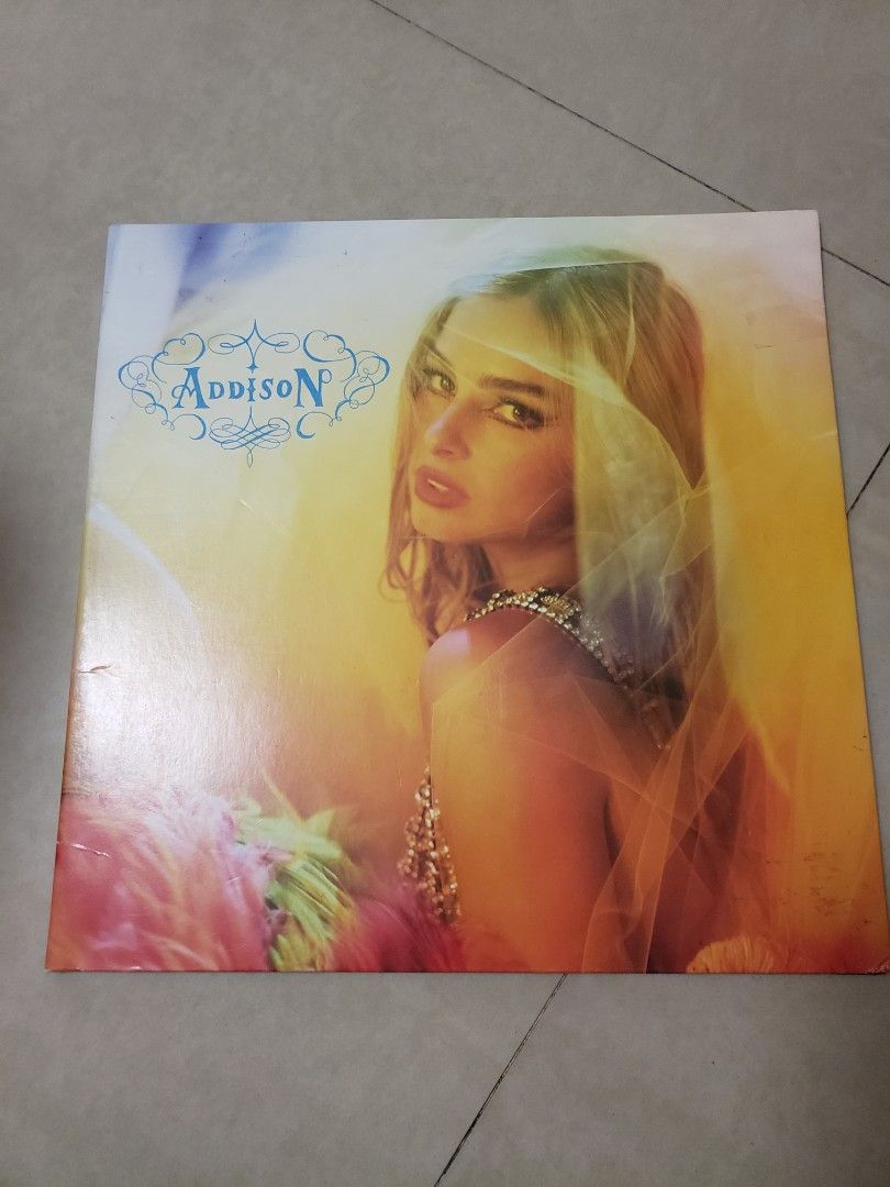 Addison - Addison Rae Vinyl (Category: Vinyls) located in Paranaque City. Submitted by themanhole (Listing ID 1468705561, Image 1). Description: The image shows the vinyl record cover for Addison, the highly anticipated debut studio album by American pop singer Addison Rae. Released on June 6, 2025, through Columbia Records, the album marks her transition into a fully realized alt-pop and electronic sound. The project features several of her majo