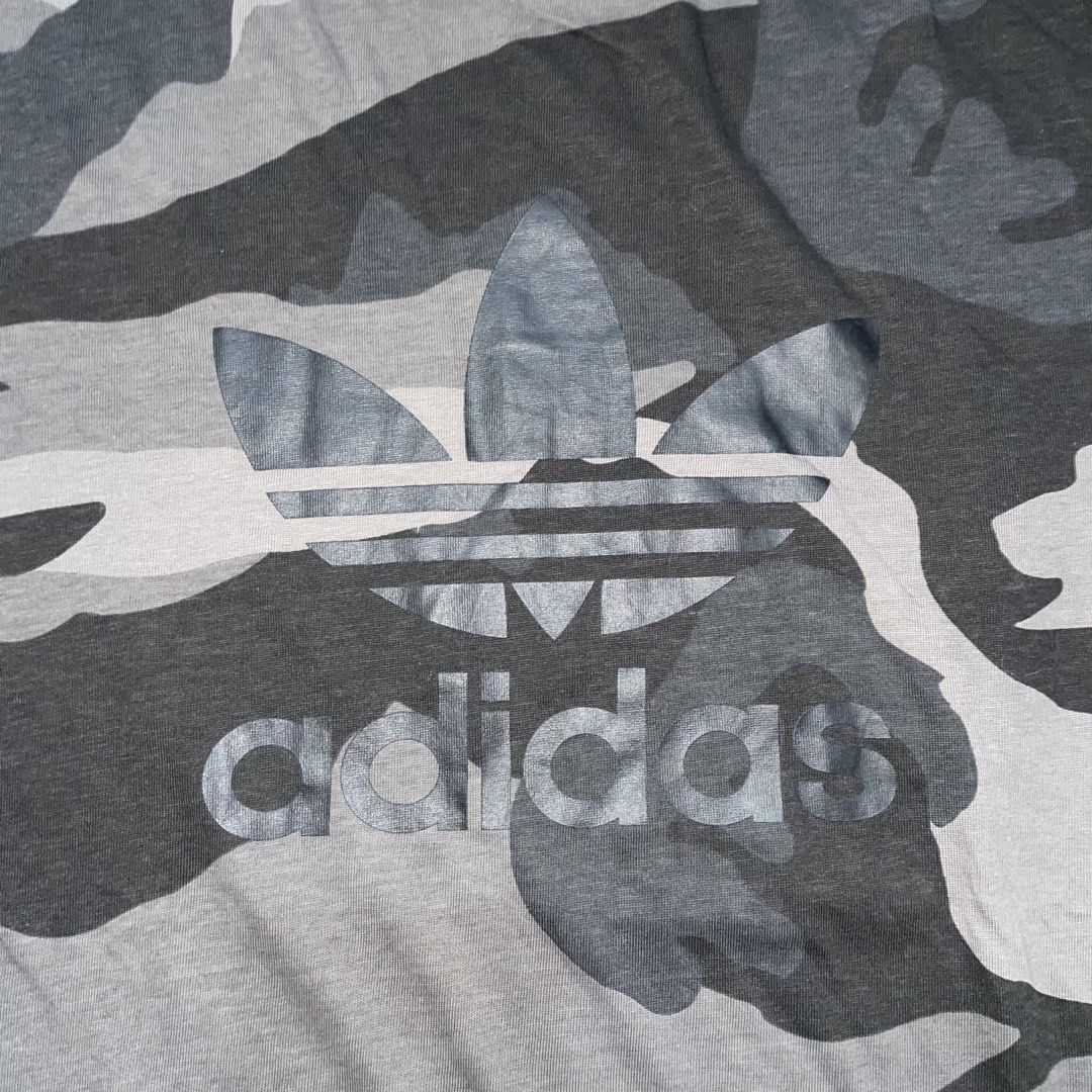 adidas (Category: Tshirts & Polo Shirts ) located in Caloocan City. Submitted by thriftytripter (Listing ID 1468584857, Image 3). Description: +Shipping fee width • 20.5 length • 27 sleeves • 8.5 condition • 9.5/10 color rate • 9.5/10 issue • slightly fading on neckline • Check details before buying • Items are washed and ready to wear • Color may vary due to lighting.