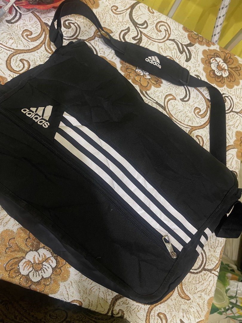 Adidas Bag (Category: Sling Bags) located in Marikina City. Submitted by greatfindsmnlph (Listing ID 1468681278, Image 1). Description: Adi das Bag Price: 250 Size: Large Width: 20 Length: 15 Color: Black Color Rate: 10/10 Condition: 9.8/10 with minor flaws Very nice in actual.