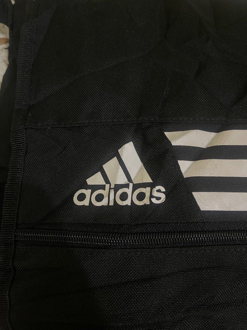 Adidas Bag (Category: Sling Bags) located in Marikina City. Submitted by greatfindsmnlph (Listing ID 1468681278, Image 3). Description: Adi das Bag Price: 250 Size: Large Width: 20 Length: 15 Color: Black Color Rate: 10/10 Condition: 9.8/10 with minor flaws Very nice in actual.