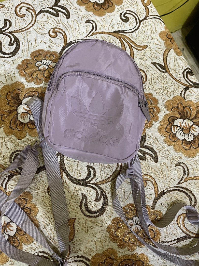Adidas Bag (Category: Babies & Kids Fashion) located in Marikina City. Submitted by greatfindsmnlph (Listing ID 1468711520, Image 2). Description: Adi das Bag Price: 200 Size: Small Width: 8 Length: 9 Color: Lavender Color Rate: 10/10 Condition: 10/10 almost new Very nice in actual.