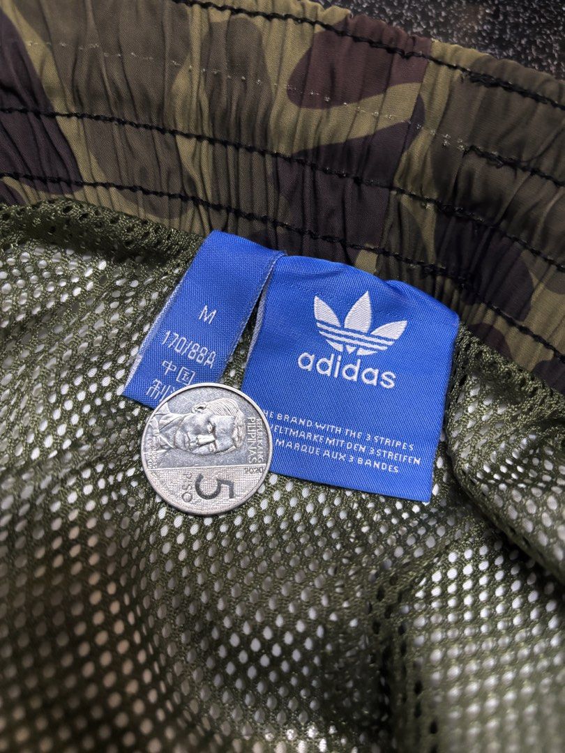 Adidas Camo (Category: Shorts) located in Cavite. Submitted by staythrifted.23 (Listing ID 1468601917, Image 2). Description: Medium on 🏷️ L 18 W 30 - 34 Like new Color rate 10/10 Issue ❌ Loc. Cavite We ship nationwide Payment first .
