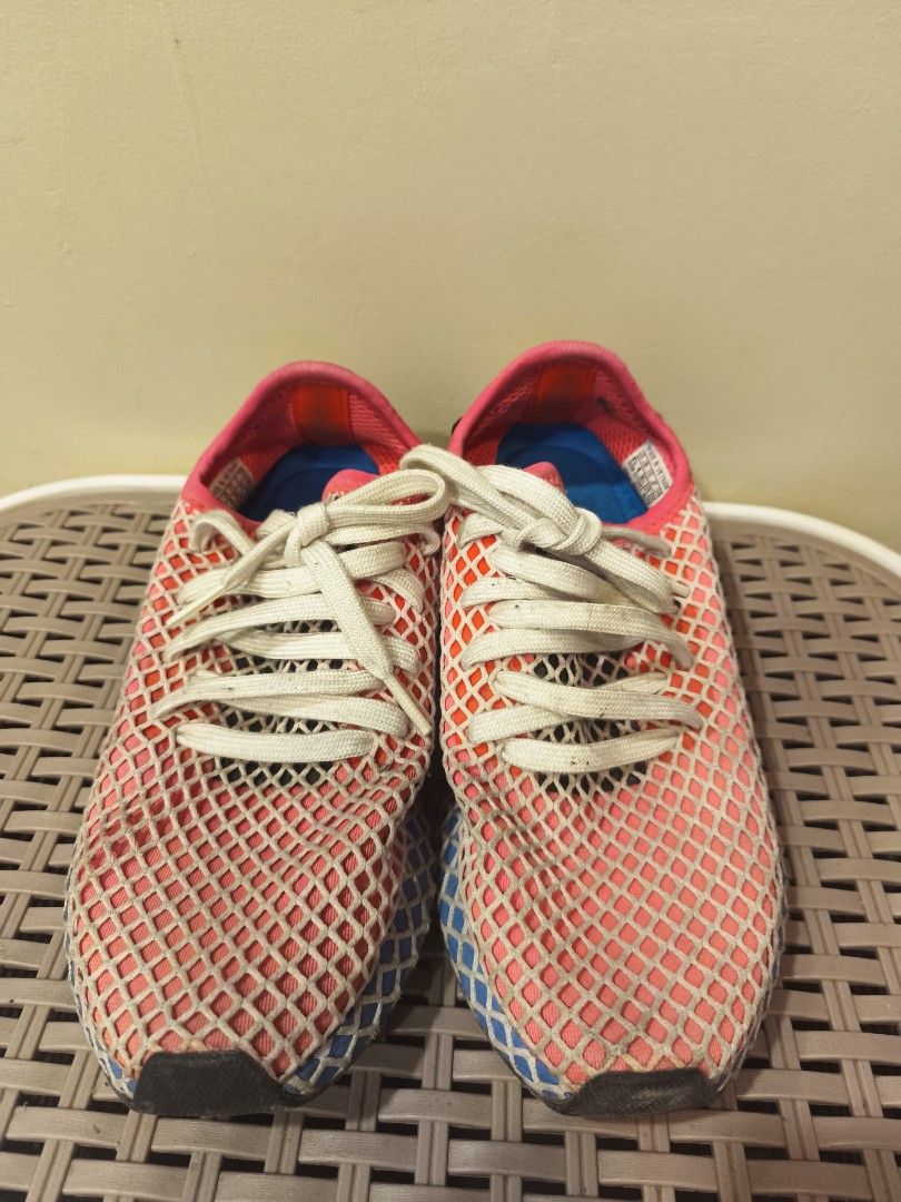Adidas Deerupt Runner Pink Blue Net Sneakers (Category: Sneakers) located in Baguio. Submitted by zia_zab (Listing ID 1468529826, Image 2). Description: - Brand: Adidas Deerupt Runner - Colorway: Pink, white, and blue with black heel patches and bright blue insoles - Size: US 4.5 | UK 4 | FR 36 2/3 - Design: Iconic web-covered mesh upper with Trefoil logo and white laces - Condition: Pre-loved with minor dirt on the white laces and midsoles from 