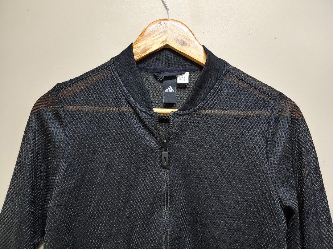 Adidas Mesh Jacket Womens Medium (Category: Coats, Jackets and Outerwear) located in Dagupan City. Submitted by upforgrabs2400 (Listing ID 1468639043, Image 2). Description: Adidas Mesh Jacket - Color: Classic Black - Size: Medium (Shoulders: 16", Chest: 18.5", Length: 24") - Material: Lightweight, highly breathable mesh - Features: Full zip front, ribbed collar and cuffs, iconic logo patch near hem - Condition: Excellent / Thrifted.