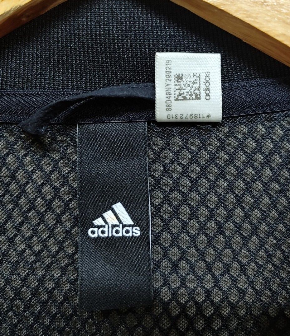 Adidas Mesh Jacket Womens Medium (Category: Coats, Jackets and Outerwear) located in Dagupan City. Submitted by upforgrabs2400 (Listing ID 1468639043, Image 3). Description: Adidas Mesh Jacket - Color: Classic Black - Size: Medium (Shoulders: 16", Chest: 18.5", Length: 24") - Material: Lightweight, highly breathable mesh - Features: Full zip front, ribbed collar and cuffs, iconic logo patch near hem - Condition: Excellent / Thrifted.
