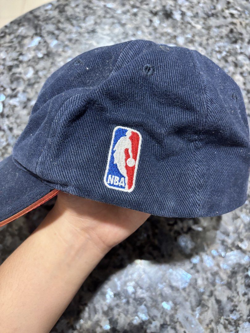 Adidas Philadelphia 76ers NBA Strapback Cap (Category: Caps & Hats) located in Taytay. Submitted by chippylala (Listing ID 1468641407, Image 2). Description: - Authentic Adidas Philadelphia 76ers hat in classic navy blue - Features embroidered team logo on the front and NBA patch on the side - Adjustable metal slider strap at the back for a custom fit - Made from durable and comfortable cotton twill fabric - Condition: Shows light wear and dust, 