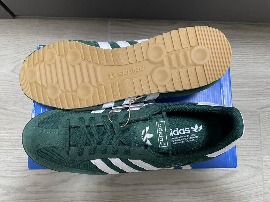 Adidas R71 (Category: Sneakers) located in San Fernando. Submitted by migifinds (Listing ID 1468546218, Image 2). Description: - Classic Adidas R71 sneakers - Deep green suede and mesh upper - White stripes and heel tab - Retro gum sole - Comes with replacement box - Ideal for casual wear - Size 9.5 - Bnew with tags from 🇺🇸 Pm me for more details.