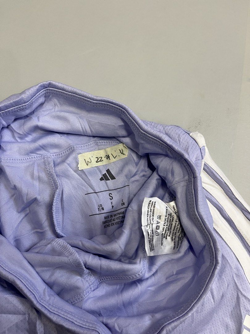 ADIDAS SKIRT (Category: Skirts) located in Mabalacat. Submitted by aas_thriftfings (Listing ID 1468577607, Image 3). Description: - Brand: Adidas - Style: Sports skort (skirt with built-in inner shorts) - Color: Light purple / lavender with white 3-stripes - Size: S (US 7/8) - Features: Breathable athletic fabric, elastic waistband, signature Adidas logo on the hem - Ideal for: Tennis, golf, badminton, working out, or casual streetwear.