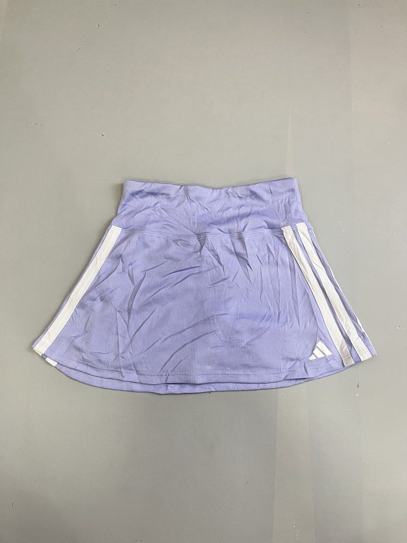 ADIDAS SKIRT (Category: Skirts) located in Mabalacat. Submitted by aas_thriftfings (Listing ID 1468577607, Image 1). Description: - Brand: Adidas - Style: Sports skort (skirt with built-in inner shorts) - Color: Light purple / lavender with white 3-stripes - Size: S (US 7/8) - Features: Breathable athletic fabric, elastic waistband, signature Adidas logo on the hem - Ideal for: Tennis, golf, badminton, working out, or casual streetwear.