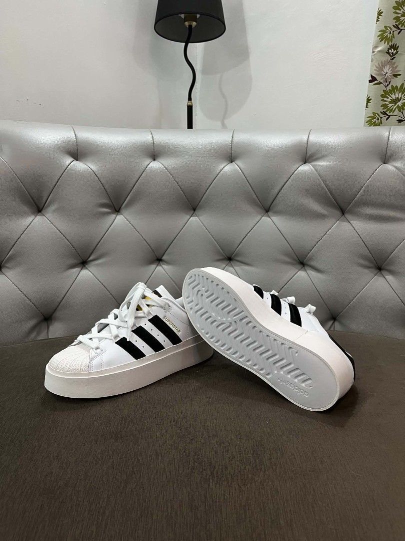 Adidas Superstar Sneakers Size US 8 (Category: Sneakers) located in Marikina City. Submitted by jemalynpdc77 (Listing ID 1468587942, Image 3). Description: - Model: Adidas Superstar Platform Sneakers - Color: White leather with black stripes - Size: US 8 | UK 6.5 | EU 40 - Features: Classic shell toe, chunky platform sole, gold tongue branding - Condition: Brand new Pristine, clean uppers, zero sole wear, and absolutely no creases. Bought in Cana