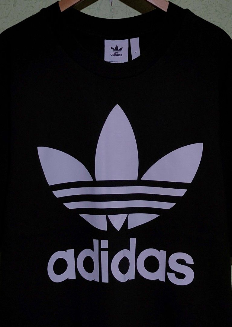 Adidas Trefoil Big Logo (Category: Tshirts & Polo Shirts ) located in Catbalogan. Submitted by thriftwthbart (Listing ID 1468563715, Image 2). Description: Reay to wear size Medium on tag width: 21 length: 28.5 color rate: 10/10 no issue.