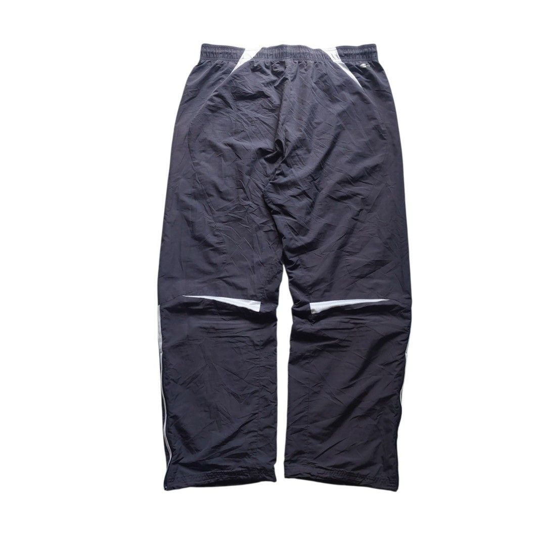 Adidas Vintage Track Pants (Category: Joggers) located in Quezon City. Submitted by y3thriftshop (Listing ID 1468559354, Image 2). Description: Tag: Adidas Vintage Track Pants Color : Dark Grey Size : L on Tag Dimension : 36-38x42 Leg Opening: 10 Condition : Good Color Rate : 9/10 Price : P599.00 Issue : Light torn part at the waist string (see last photo) RFS : Buy and Sell Additional Information : - 2 Side Pockets - Draw Srltring Still Intact -