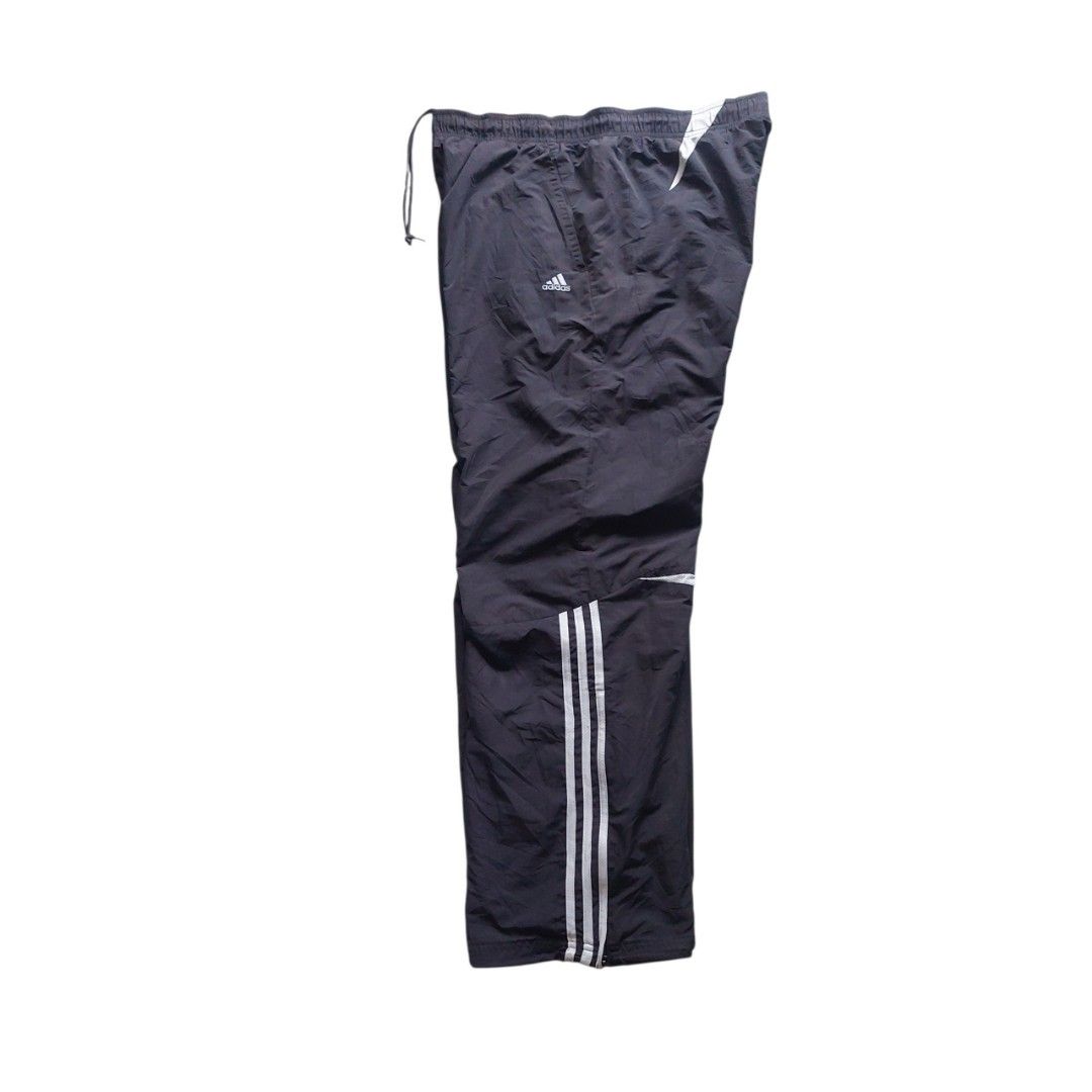Adidas Vintage Track Pants (Category: Joggers) located in Quezon City. Submitted by y3thriftshop (Listing ID 1468559354, Image 3). Description: Tag: Adidas Vintage Track Pants Color : Dark Grey Size : L on Tag Dimension : 36-38x42 Leg Opening: 10 Condition : Good Color Rate : 9/10 Price : P599.00 Issue : Light torn part at the waist string (see last photo) RFS : Buy and Sell Additional Information : - 2 Side Pockets - Draw Srltring Still Intact -