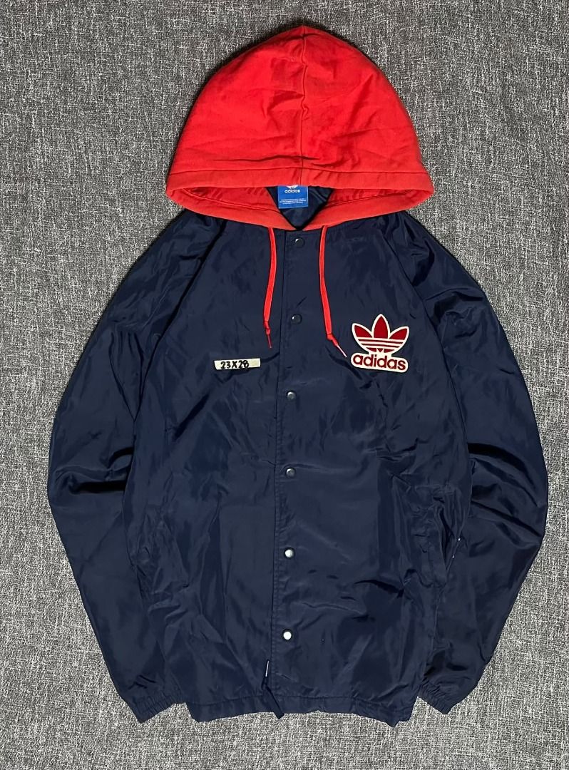 Adidas Windbreaker Snap Button Parka (Category: Coats, Jackets and Outerwear) located in Manila. Submitted by thriftedbykab (Listing ID 1468549395, Image 1). Description: -Adidas Windbreaker Snap Button Parka -Complete tags -Size: (M-L) -Width: 23 | Length: 28 -Condition: As new -Color Rate:9 /10 -Issue: No issue.