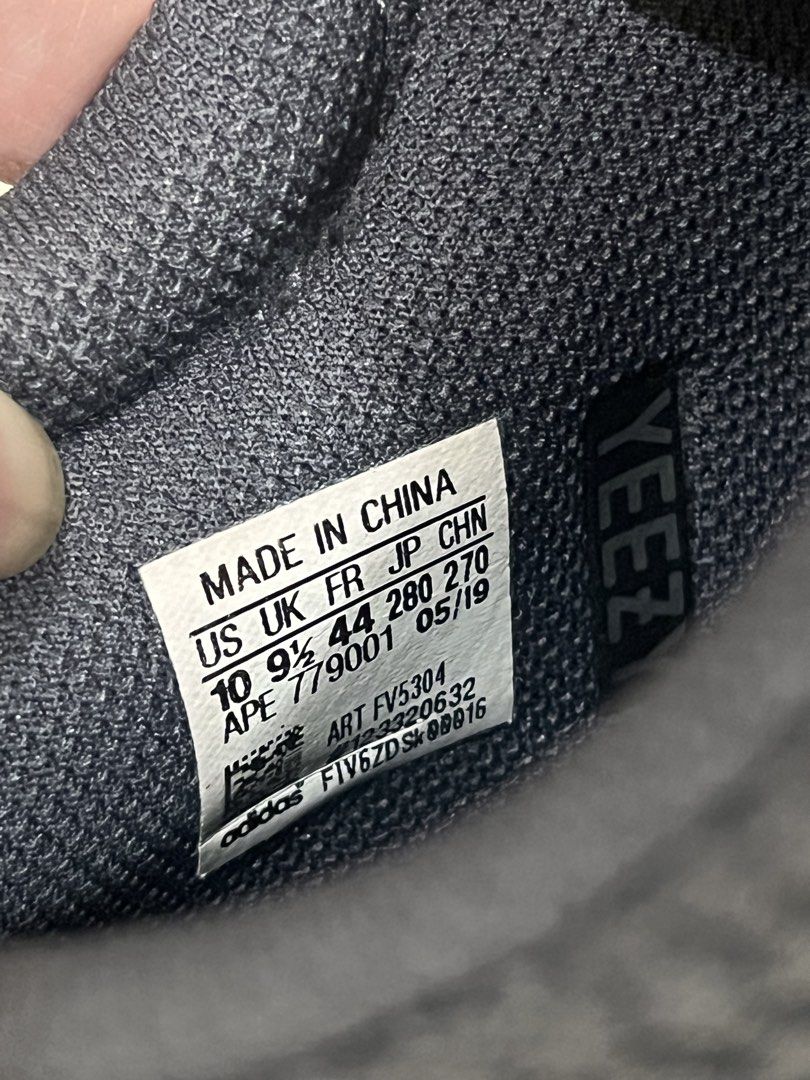 Adidas Yeezy Boost 700 Utility Black Size US 10 (Category: Sneakers) located in Quezon City. Submitted by adriangrafilo (Listing ID 1468622099, Image 3). Description: - Model: Adidas Yeezy Boost 700 Utility Black - Size: US 10 / UK 9.5 / FR 44 - Condition: Great pre-owned condition with clean insoles and readable size tag (05/19) - Details: Dark grey suede/mesh upper, chunky midsole, gum outsole, and reflective speckled rope laces - Style: Super 