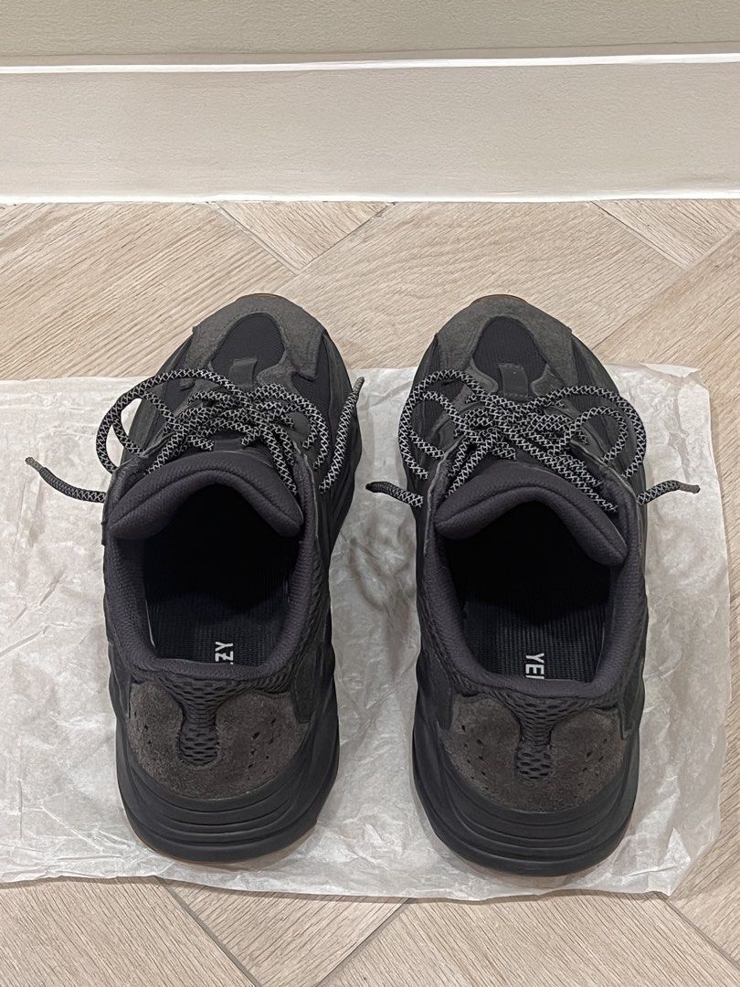 Adidas Yeezy Boost 700 Utility Black Size US 10 (Category: Sneakers) located in Quezon City. Submitted by adriangrafilo (Listing ID 1468622099, Image 1). Description: - Model: Adidas Yeezy Boost 700 Utility Black - Size: US 10 / UK 9.5 / FR 44 - Condition: Great pre-owned condition with clean insoles and readable size tag (05/19) - Details: Dark grey suede/mesh upper, chunky midsole, gum outsole, and reflective speckled rope laces - Style: Super 