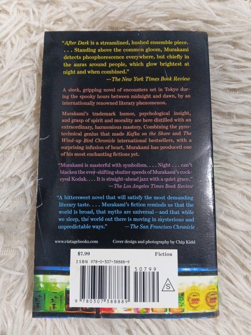 After Dark by Haruki Murakami Paperback Novel (Category: Storybooks) located in Cavite. Submitted by nathstelein_finds (Listing ID 1468646016, Image 2). Description: - Title: After Dark by Haruki Murakami - Edition: Vintage paperback (2007, ISBN: 978-0-307-38888-9) - Genre: Contemporary Japanese fiction set in Tokyo - Condition: Pages have natural tanning and yellowing; cover edges show mild wear and creasing; spine is intact and fully readable -