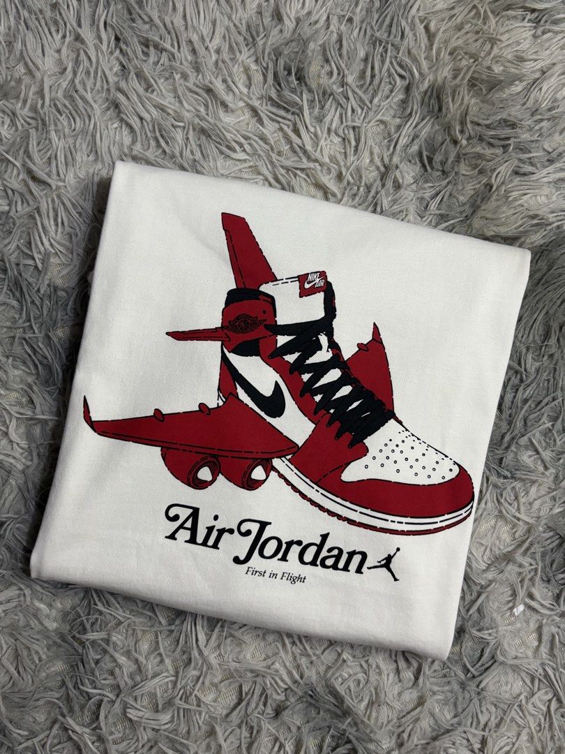 Air Jordan First in Flight Graphic White Tee (Category: Tshirts & Polo Shirts ) located in Tarlac. Submitted by thirstthriftapparelz_ (Listing ID 1468687700, Image 1). Description: Brand: Jordan Condition:Excellent Size: Large Color rate:9.5 Issue:None.