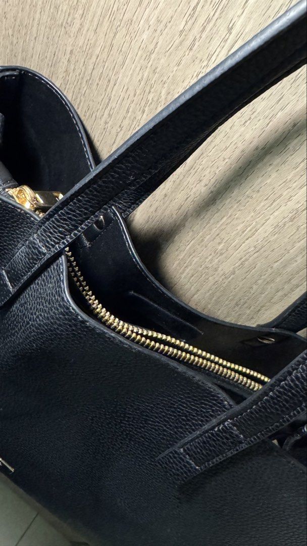 ALDO Black Tote Bag (Category: Tote Bags) located in Manila. Submitted by neilletigio (Listing ID 1468693290, Image 3). Description: ALDO Black Tote Bag • Lightly used and in very good condition • Clean exterior • Black pebbled finish • Gold-tone ALDO hardware • Spacious enough for everyday essentials • Long shoulder straps • No major visible flaws.