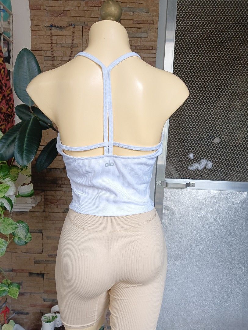 ALO Yoga Tank Top (Category: Activewear) located in Rizal. Submitted by timeless_shop (Listing ID 1468549015, Image 3). Description: Original ALO YOGA Ribbed 👚 Type: Ribbed T-Back Crop Top 📏 Size: LARGE Fit Bust 34-36 Meron Removable Cup pad 🧵 Fabric: Premium Ribbed 🎨 Color: White - Very Nice Color! ⭐ Condition Rate: 9/10 - LIKE NEW! 🌈 Color Rate: 9/10 - White Maayos at malinis din ito 📍 Location: Rizal 💳 Payment first Gcash BPI 🚚 Shippin