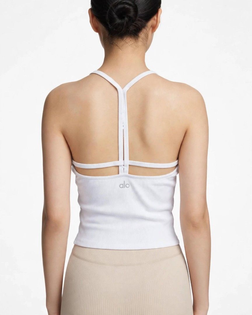 ALO Yoga Tank Top (Category: Activewear) located in Rizal. Submitted by timeless_shop (Listing ID 1468549015, Image 1). Description: Original ALO YOGA Ribbed 👚 Type: Ribbed T-Back Crop Top 📏 Size: LARGE Fit Bust 34-36 Meron Removable Cup pad 🧵 Fabric: Premium Ribbed 🎨 Color: White - Very Nice Color! ⭐ Condition Rate: 9/10 - LIKE NEW! 🌈 Color Rate: 9/10 - White Maayos at malinis din ito 📍 Location: Rizal 💳 Payment first Gcash BPI 🚚 Shippin