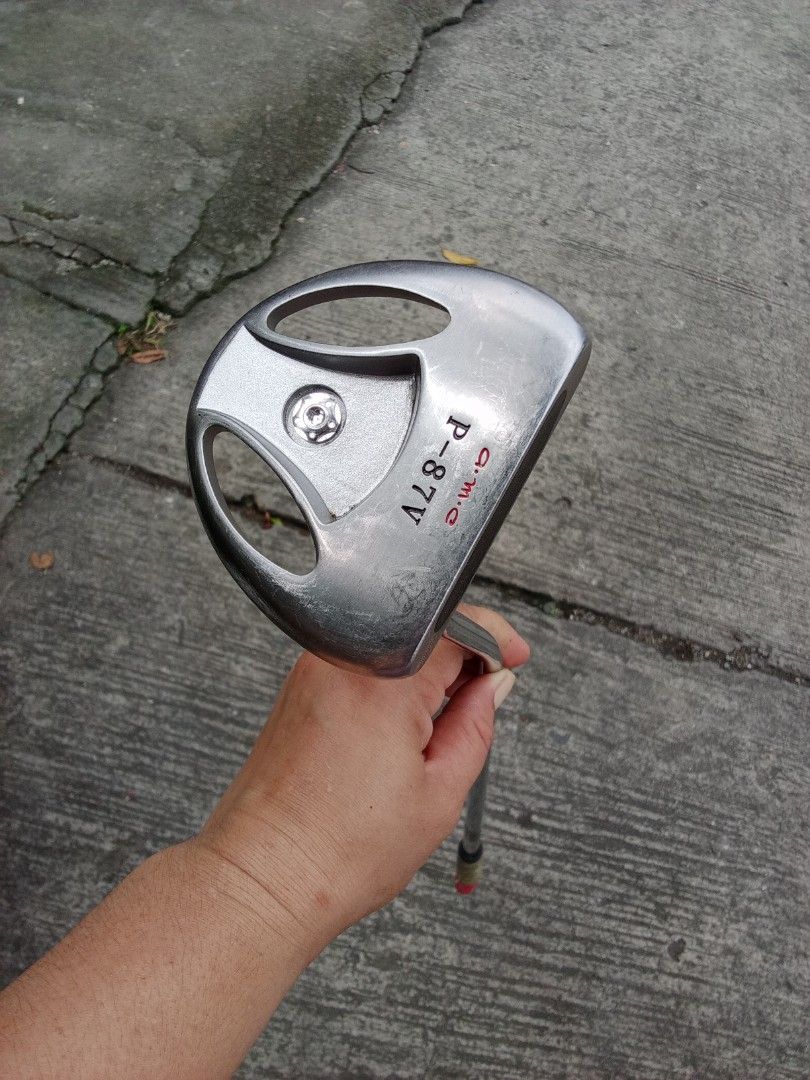 a.m.c. P-87V mallet-style golf putter. 34" (Category: Golf) located in San Pedro. Submitted by trisheljas_japansurplus (Listing ID 1468548219, Image 1). Description: 📍For Sale📍 a.m.c. P-87V mallet-style golf putter. Brand / Manufacturer: a.m.c. Model: P-87V Design: Large mallet head with cut-out windows and a central alignment screw or weight port. Club Type: Putter (designed for precision on the green). location 📍 Filinvest Homesite barangay 
