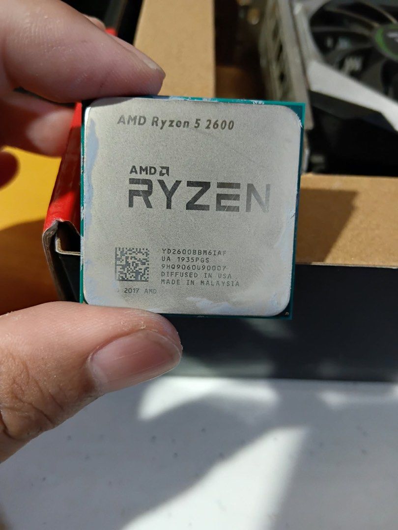 AMD Ryzen 5 2600 Desktop Processor (Category: Desktops) located in Marikina City. Submitted by lanej (Listing ID 1468634830, Image 1). Description: - Model: AMD Ryzen 5 2600 - Specs: 6 Cores, 12 Threads, AM4 Socket - Condition: Pulled from a working custom PC upgrade - Pins: 100% straight and undamaged ₱2800 No issue RFS: upgrade.