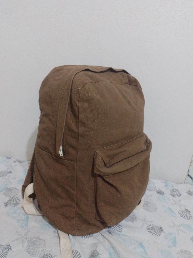 American Apparel Canvas Backpack Brown Made in USA (Category: Backpacks) located in Imus. Submitted by bestfinds_yeth0724 (Listing ID 1468653475, Image 2). Description: - Brand: American Apparel - Origin: Made in USA - Material: Sturdy brown canvas - Compartments: Main zip compartment + exterior front zip pocket - Features: Adjustable back straps - Style: Neutral, simple everyday backpack MOP gcash Locstion Imus Cavite.