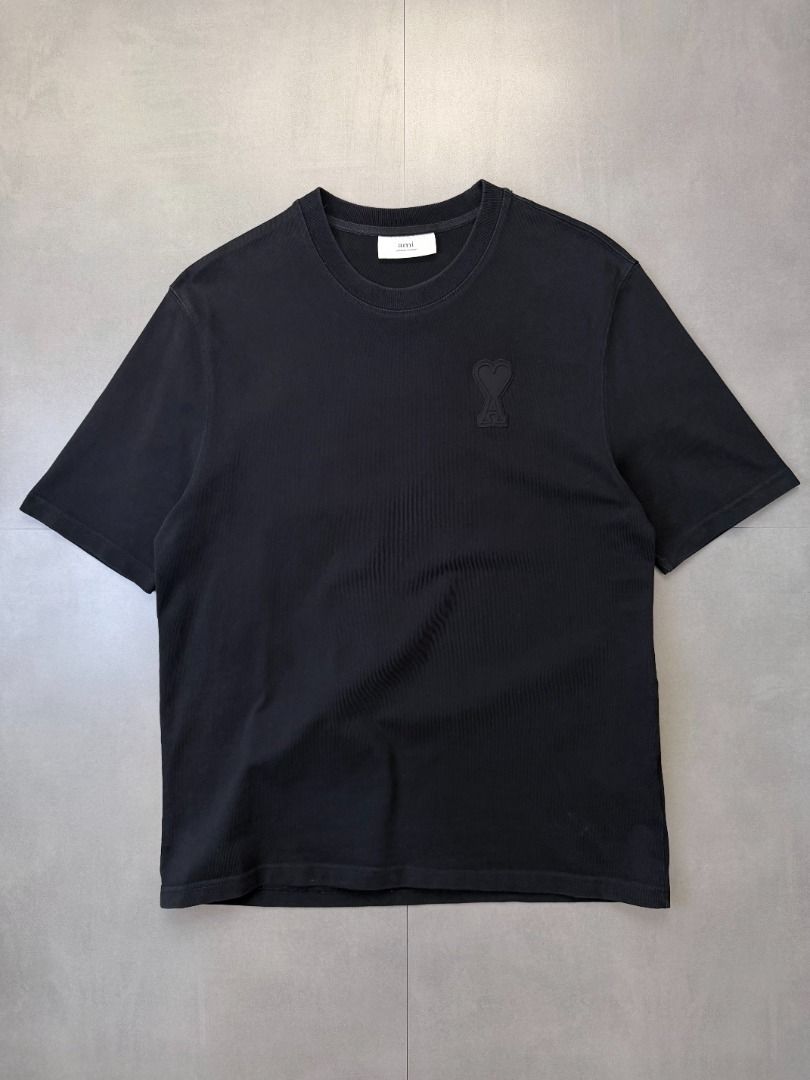 Ami Embossed Logo tee shirt (Category: Tshirts & Polo Shirts ) located in Cabanatuan. Submitted by argarments.ph (Listing ID 1468576931, Image 2). Description: Tagged: Large on tag Width 22" | Length 29.5" Condition: Excellent condition. Thick fabric Issue(s): -.