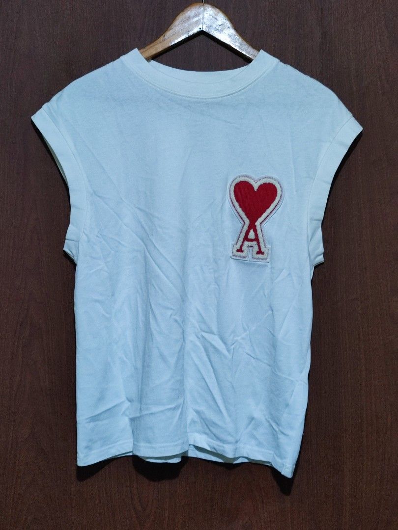 Ami Paris "Ami de Cœur" Large Patch Sleeveless Top (Category: Tshirts & Polo Shirts ) located in Pasig City. Submitted by supremokicksmanila (Listing ID 1468543903, Image 1). Description: Ami Paris "Ami de Cœur" Large Patch Sleeveless Top 20x25 excellent condition 1499 shipped dm to purchase lalamove within metro j&t outside metro no return and exchange policy.