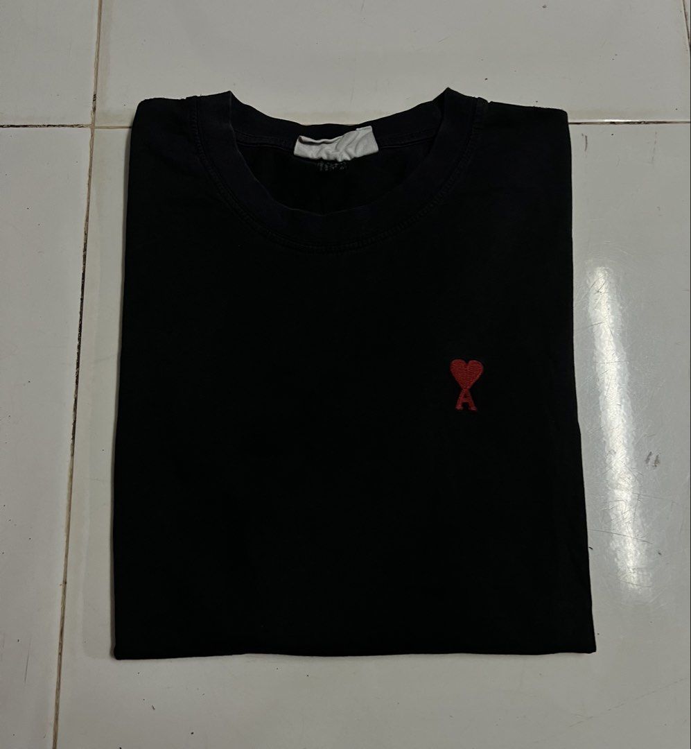 AMI Tshirt (Category: Tshirts & Polo Shirts ) located in Iloilo. Submitted by deric.john93 (Listing ID 1468652114, Image 2). Description: size medium on tag 20 width 27.5 length no flaws excellent condition 9.8/10 color rate Authentic 1500.
