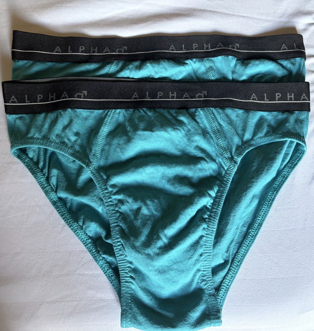 Anko Alpha Men's Briefs Turquoise Size M 2-Pack (Category: Underwear) located in Quezon City. Submitted by pool_boy (Listing ID 1468579731, Image 1). Description: Anko Alpha Male medium rise briefs - Men's briefs with standard cut and supportive front pouch seam - Medium (printed tag), fits 30-33 waist - Color: Turquoise - Material: 100% Cotton - Features: Alpha branded elastic waistband - Quantity: 2 pairs for ₱100 .