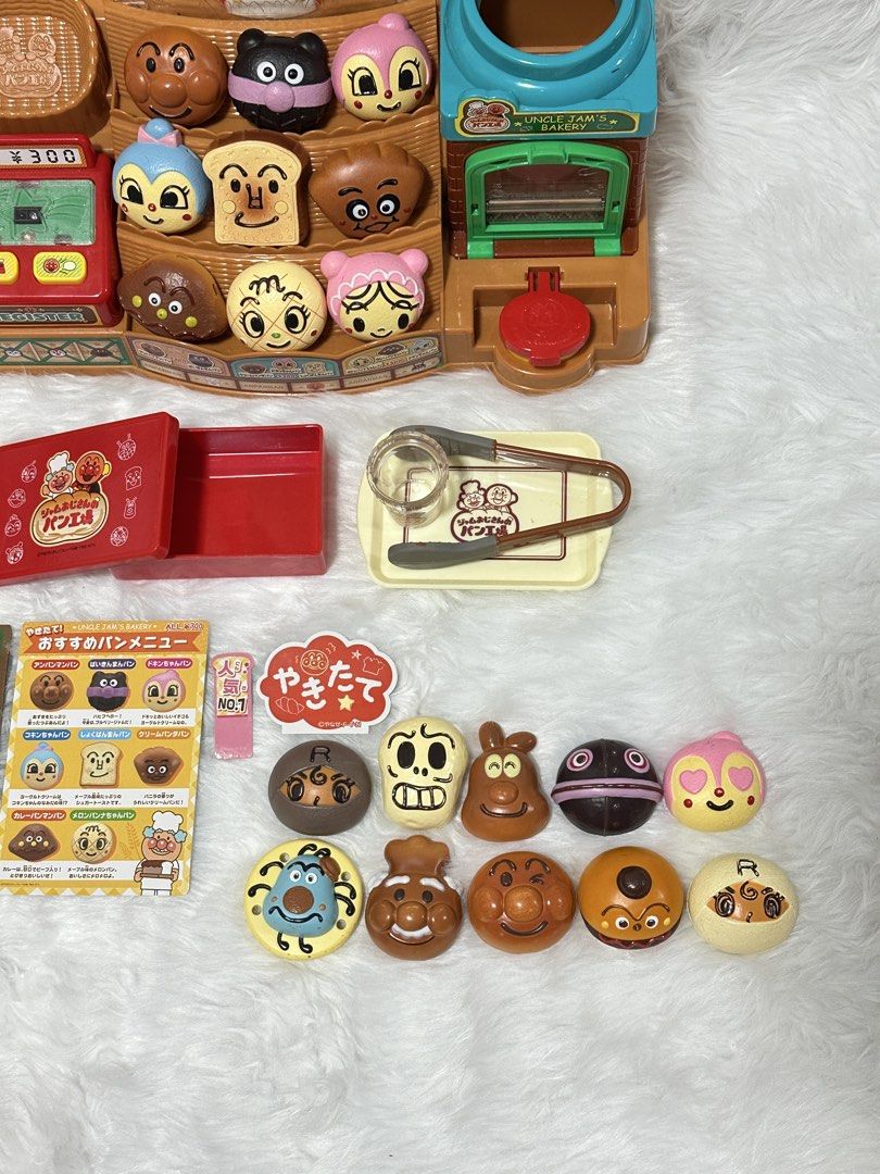 Anpanman Uncle Jam's Bakery Playset with Accessories (Category: Kids Toys) located in Cavite. Submitted by kobebean_122 (Listing ID 1468633696, Image 3). Description: - Official Anpanman bakery playset featuring the Uncle Jam character - Complete set includes an oven, cash register, drink bar, tongs, trays, and menu guide - Comes with tons of cute character bread pieces - Great for hours of imaginative pretend play for young kids.
