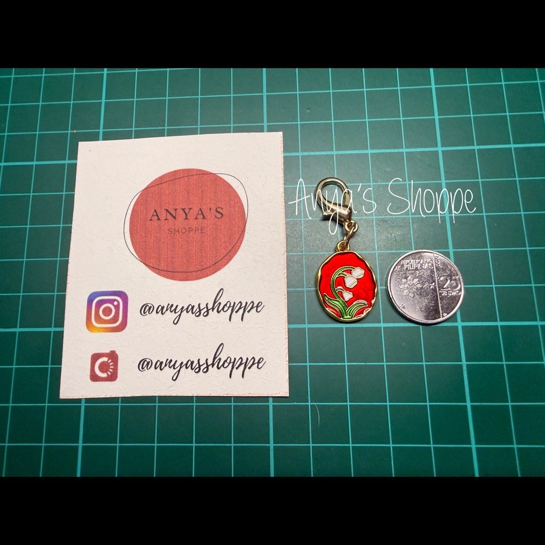 Floral Enamel Journal Charms (Category: Charms) located in Paranaque City. Submitted by anyasshoppe (Listing ID 1468705853, Image 3). Description: - 4 vibrant enamel charms for your journals - Includes pink, red, white, and orange floral designs Disclaimer: Actual color varies on the photos due to lighting conditions - Features gold-tone metal hardware and secure clasps - Coin-sized for versatile use (shown next to a 25-centavo piece for scale) -