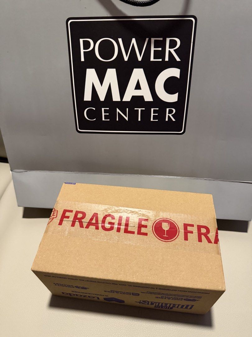 Apple iPhone 18 Pro Max 512 GB Burgundy (Category: iPhone 18 Series) located in Bacoor. Submitted by dennisdeals (Listing ID 1468511704, Image 1). Description: - 100% Brand new and factory sealed in original brown shipping box - Unopened package straight from Power Mac Center delivery - Free original PMC paper bag included in the background - Exact contents are a mystery since the box has never been opened - Buy with confidence from a trusted, hi