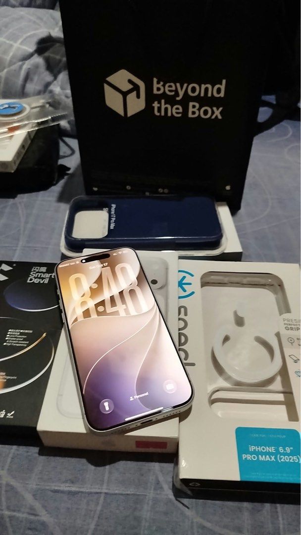 Apple iPhone Pro Max Silver with Phone Cases and Accessories (Category: iPhone 17 Series) located in Makati City. Submitted by caloy1017 (Listing ID 1468692656, Image 1). Description: - Model: Silver iPhone Pro Max in pristine, scratch-free condition (front and back) - Condition: Clean body with fully functional buttons, USB-C port, and triple camera setup - Inclusions: Beyond the Box paper bag, dark blue phone case, Speck MagSafe case packaging,