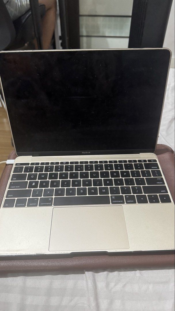 Apple MacBook Gold (Category: Laptops & Notebooks) located in Famy. Submitted by hannahsermonia (Listing ID 1468707911, Image 2). Description: - Model: Apple MacBook in stunning Gold finish - Condition: Well-maintained and fully functional - Design: Sleek Apple logo on the lid, compact keyboard layout, and responsive trackpad - Freebie: Includes a premium brown leather sleeve for extra protection - Ideal for: Students, professionals, and casual u