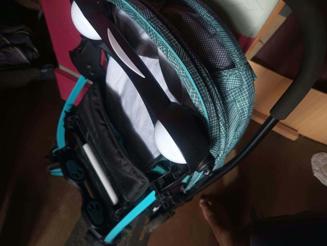 Apruva Baby Stroller Turquoise Blue Black (Category: Strollers) located in Paranaque City. Submitted by bornandbread21 (Listing ID 1468705160, Image 1). Description: - Color: Stylish Turquoise Blue and Black - Comfort & Convenience: Padded seat cushion and full canopy with a mesh window - Child Tray: Includes built-in dual cup holders - Storage: Extra-large under-seat basket for diaper bags and groceries - Mobility: Smooth-rolling wheels ideal fo