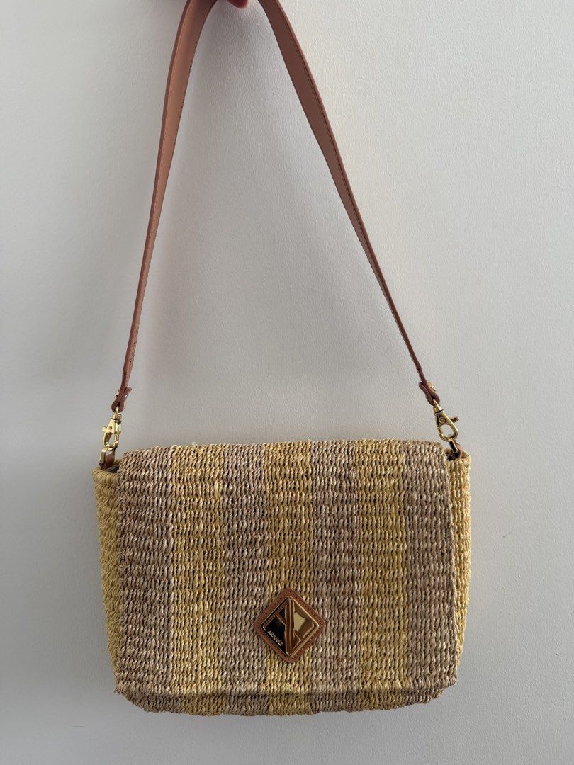 Aranaz Alex (Category: Shoulder Bags) located in Paranaque City. Submitted by balofies (Listing ID 1468660742, Image 1). Description: - Brand: Aranáz - Design: Natural and yellow vertical stripes with polished gold-tone geometric hardware - Closure: Flap closure - Strap: Removable wide strap with beige ostrich-embossed texture on one side and smooth tan leather with branded script stamp on the reverse - Style: Perfect everyday summer accessory.