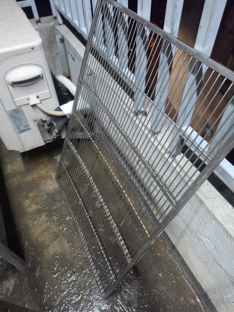 [AS IS] Used Stainless Steel Cage (Category: Food Organization & Storage) located in Makati City. Submitted by heyimkenneth (Listing ID 1468502545, Image 3). Description: - Heavy-duty stainless steel construction - Double decker design with upper and lower compartments - Ideal for dogs and other small animals - Includes mesh flooring and removable pull-out trays for easy cleaning - Sturdy metal wire frame setup - Comes complete with food bowls an